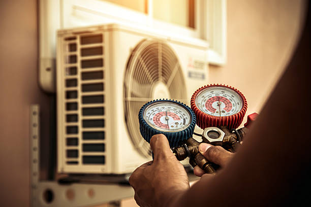 Professional Ac Installation technician working in Pisgah Forest, NC